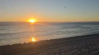 Sunrise cold morning Florida chill ocean waves calming