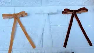 Lacinho Chanel de veludo
