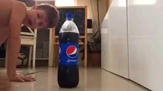 Fidget spinner v Coco bottle