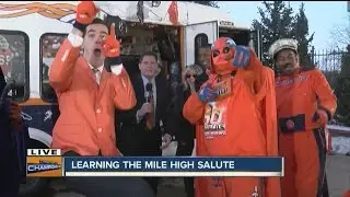 Denver7 learns the official Mile High Salute. Go Broncos!