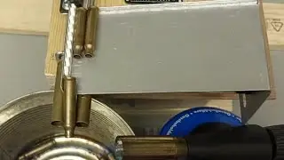 Robo-annealer: Auto-feeder for annealing rifle brass