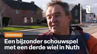 &Oacute;ngerwaeg brengt in Nuth zijn driewieler naar de fietsenmaker
