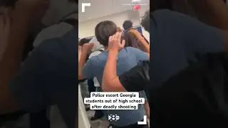 Police escort Georgia students out of high school after deadly shooting