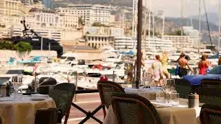 VideoVault Stock Video: Range Rover Evoque & Ferrari 812 Superfast drive through Monte-Carlo Monaco