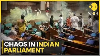 Security breach in Parliament on 2001 attack anniversary; 2 men release smoke, panic in Lok Sabha