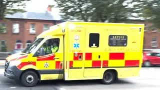 Dublin fire brigade emergency ambulance RES-AMB-1 responding on North Circular Road in Dublin