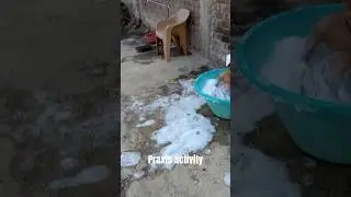 child engage in tactile sensory play using bath foam