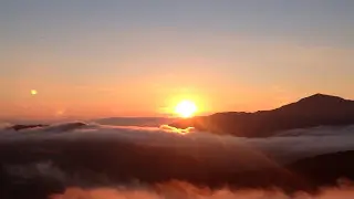 SunriseAboveClouds
