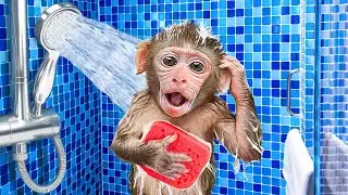 Singe Mon Mon prend un bain avec le mignon b&eacute;b&eacute; singe 🐒💦