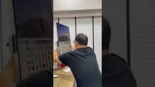 Me rotating the Pro Display XDR between landscape and portrait mode.