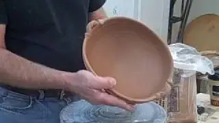 Applying Handles to a Clay Bowl Made on the Potters Wheel