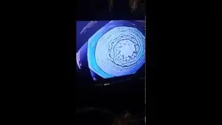 Kaleidoscopic patterns emerge from a camera screen