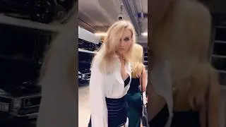 Models checking out cars #model #party #event
