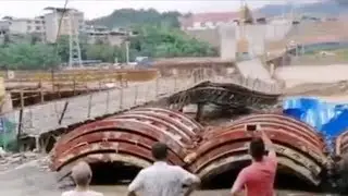 Bridge collapses as severe rains flood south China