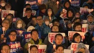 South Korean protesters call for resignation of president after martial law U-turn | AFP