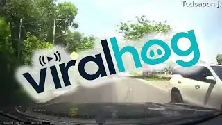 Speed Hump Nearly Sends Cyclist Under Truck || ViralHog