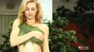 Yvonne Strahovski painted in palms and covered in coconuts for SoBe Lifewater