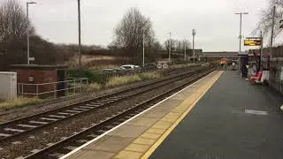 67028