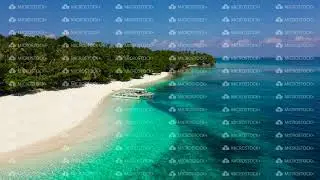 Boat on the shore of a tropical island. Mahaba Island, Philippines. Beautiful white sand beach.