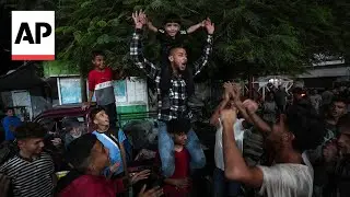 Palestinians in Gaza celebrate as skies over Israel flooded with missiles from Iran