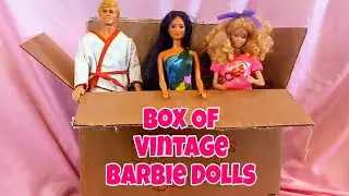 BOX OF VINTAGE BARBIE DOLLS AND CLOTHES