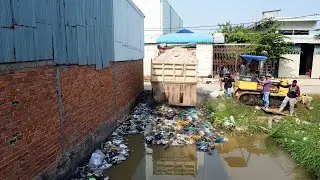 Flooded Street Repair in Progress: Massive Sand Dumping to Restore the Road