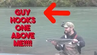Guy hooks a steelhead as I land one plunking
