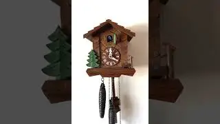 Small vintage Swiss chalet cuckoo clock. Made in Switzerland!