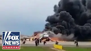 At least 13 dead as plane engulfed in flames lands at Moscow airport