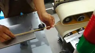 Oblique paper stick machine operate step 2  - feeding paper and start running