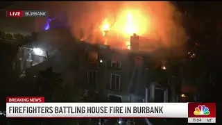 Firefighters battle house fire in Burbank