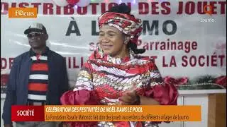 Rosalie MATONDO offre des jouets et un repas de Noël aux enfants de Loumo. 