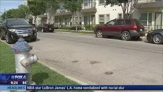 Woman carjacked outside Ross Avenue apartment
