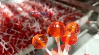 Lollipop production line with automatic stick insertion system