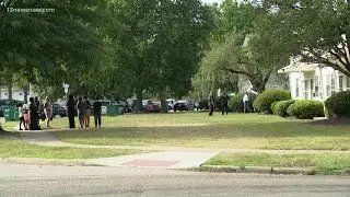 Woman brandishes gun at Norfolk school bus