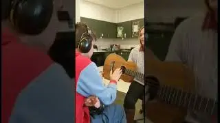 Alex strumming