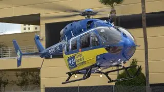 AeroMed EC145 air ambulance helicopter landing at Tampa General Hospital N911TG
