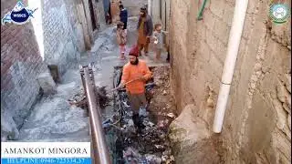 The WSSC Swat sanitation staff is carrying out cleaning of streets and drains in Amankot, Mingora.