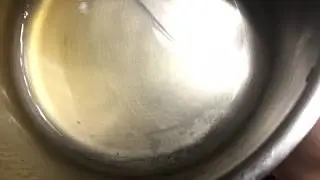 Drinking soup out of a pot.