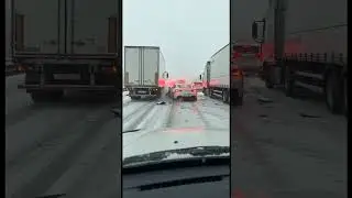 Toronto Winter Chaos: Car Slides Between Trucks &mdash; No Injuries