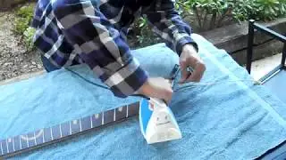 How to remove a bass guitar fretboard