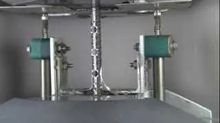 Cyclic axial response tested on a short reinforcing bar