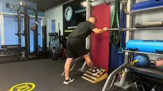 Balance Bar Hamstring Stretch