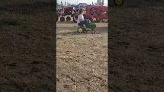 motorized John Deere pedal tractor at the Yesteryear Farm Show, 2025