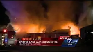 Crews battle fire in Carter Lake