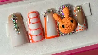Orange Duck nails freestyle ( bling, designer charm, airbrushing)