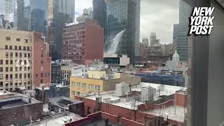 Wild video shows torrent of water bursting out of NYC high-rise
