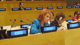 Dr. Judy Kuriansky delivering PCUN recommendations to OWG co-chairs