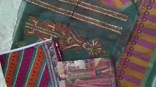 Alkaram festive collection with open pictures.