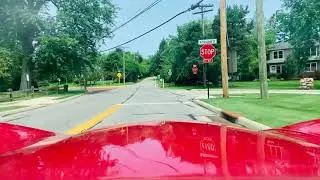 Corvette driving on longest brick road